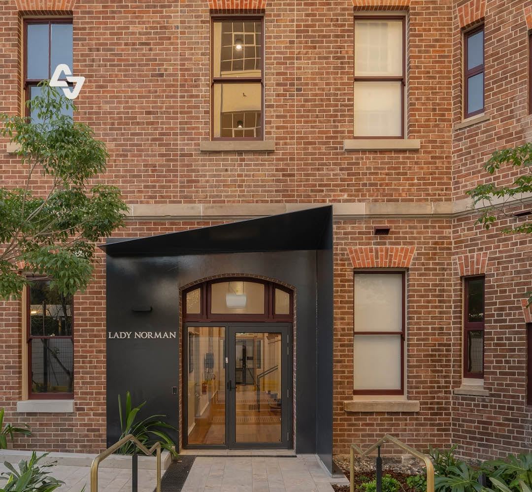 Heritage brick building entry with arched aluminium door, Lady Norman, Queensland